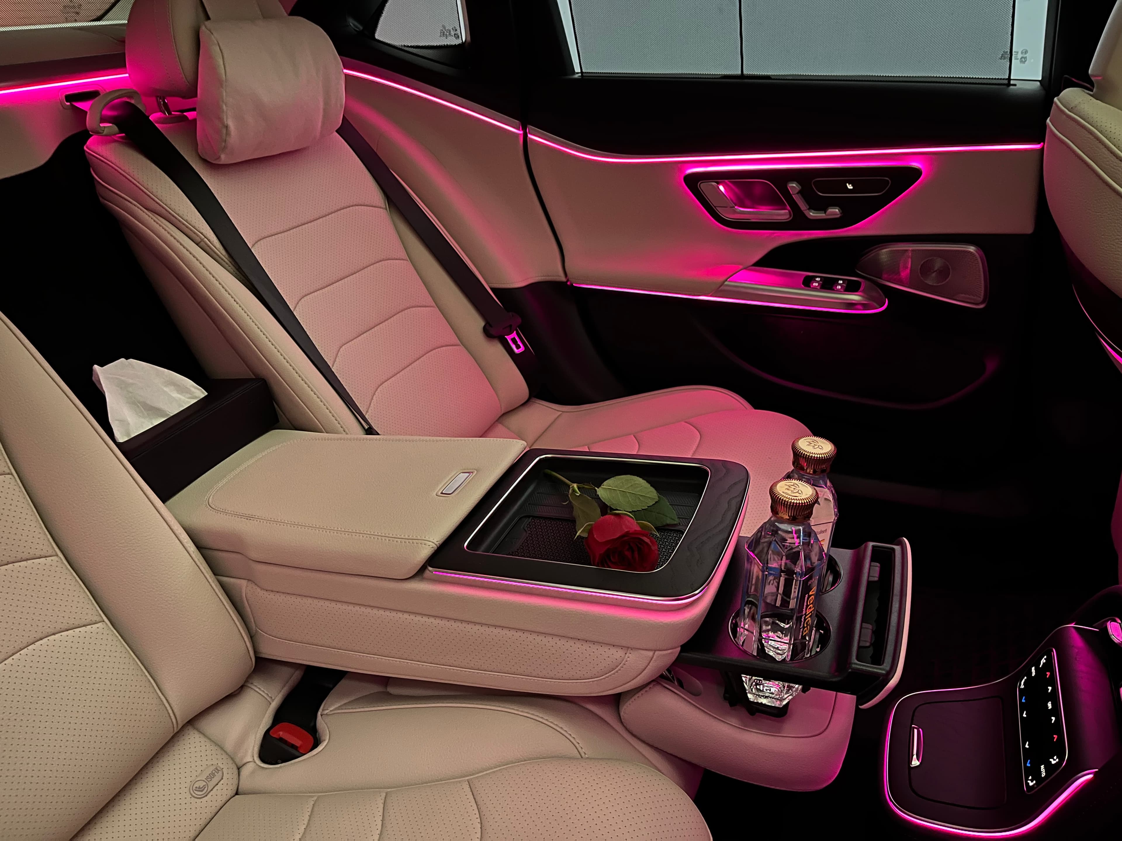 Luxury car date night experience in Bangalore — Mercedes cabin with ambient lighting, roses, and curated details